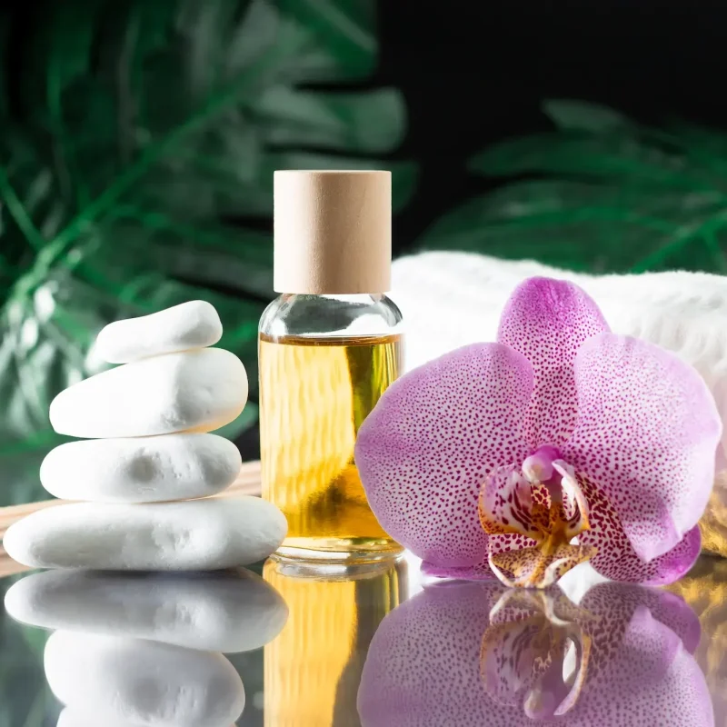 lilac-orchid-flower-clear-bottle-of-yellow-oil-w-2025-03-08-15-10-53-utc (1)